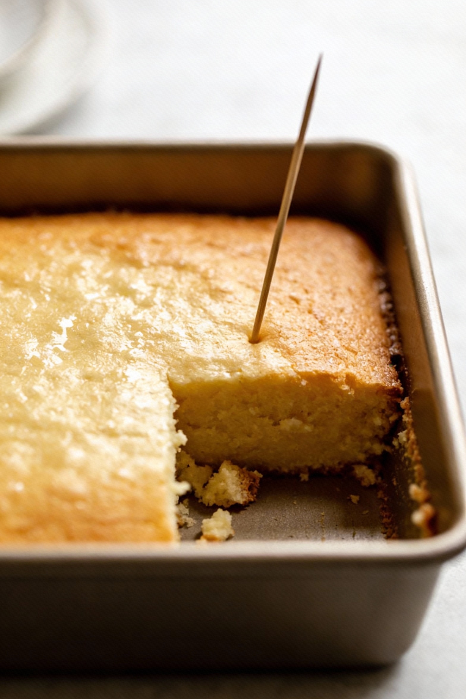 Cooking process: baked vanilla butter cake in an 8x8-inch pan just out of the oven, top lightly golden and gently spring